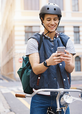 Buy stock photo Man, delivery bicycle and smile with phone, order or ecommerce app for food, product and sustainable transport. Young guy, bike and metro street with texting, chat and eco friendly with logistics job