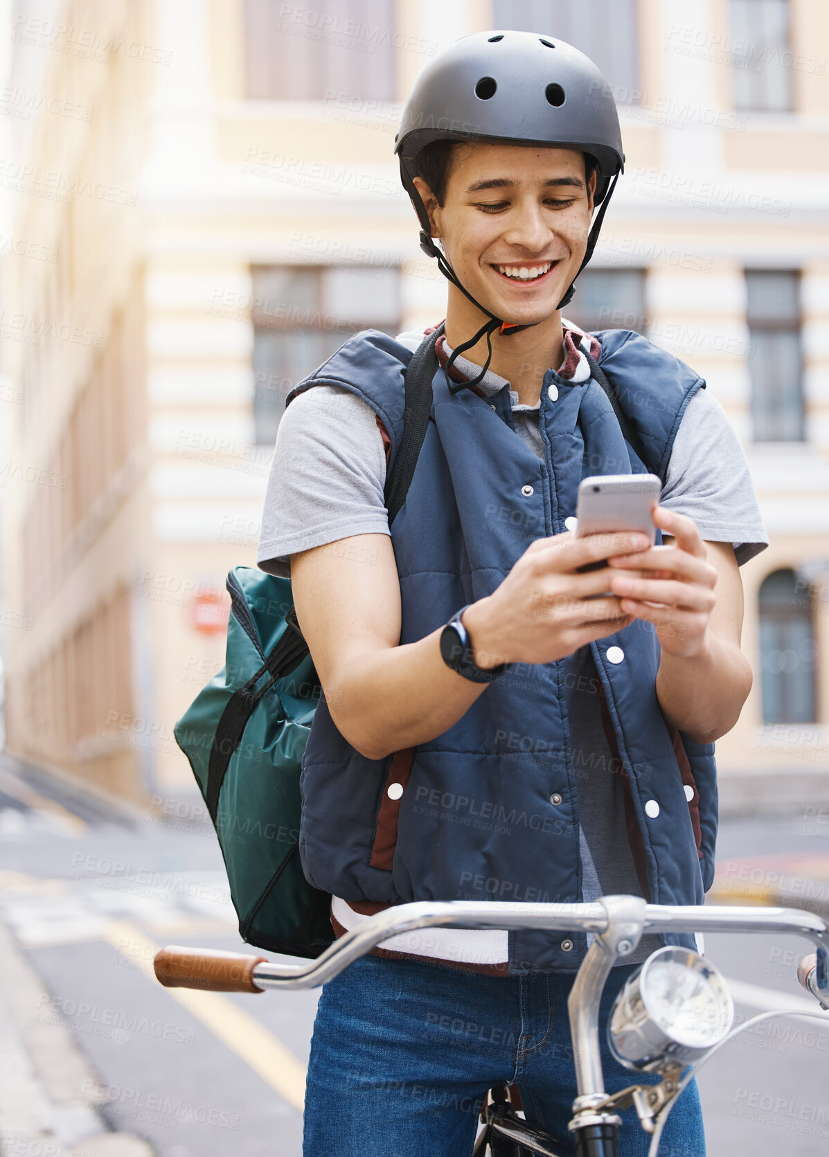 Buy stock photo Man, delivery bicycle and smile with phone, order or ecommerce app for food, product and sustainable transport. Young guy, bike and metro street with texting, chat and eco friendly with logistics job