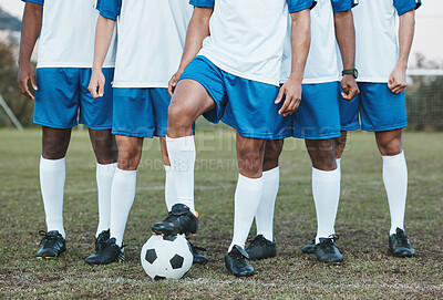 Soccer Ball And Feet On The Football Field, Football Player In