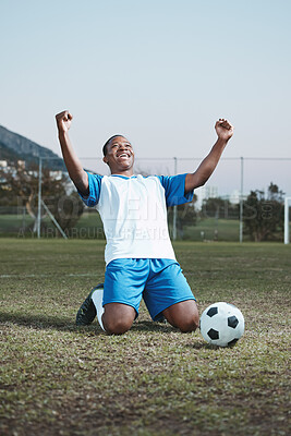 Buy stock photo Soccer ball, sports and man celebrate goal on field for competition, fitness or training outdoor. Black male athlete football player, pitch and game celebration for sport achievement, success or win