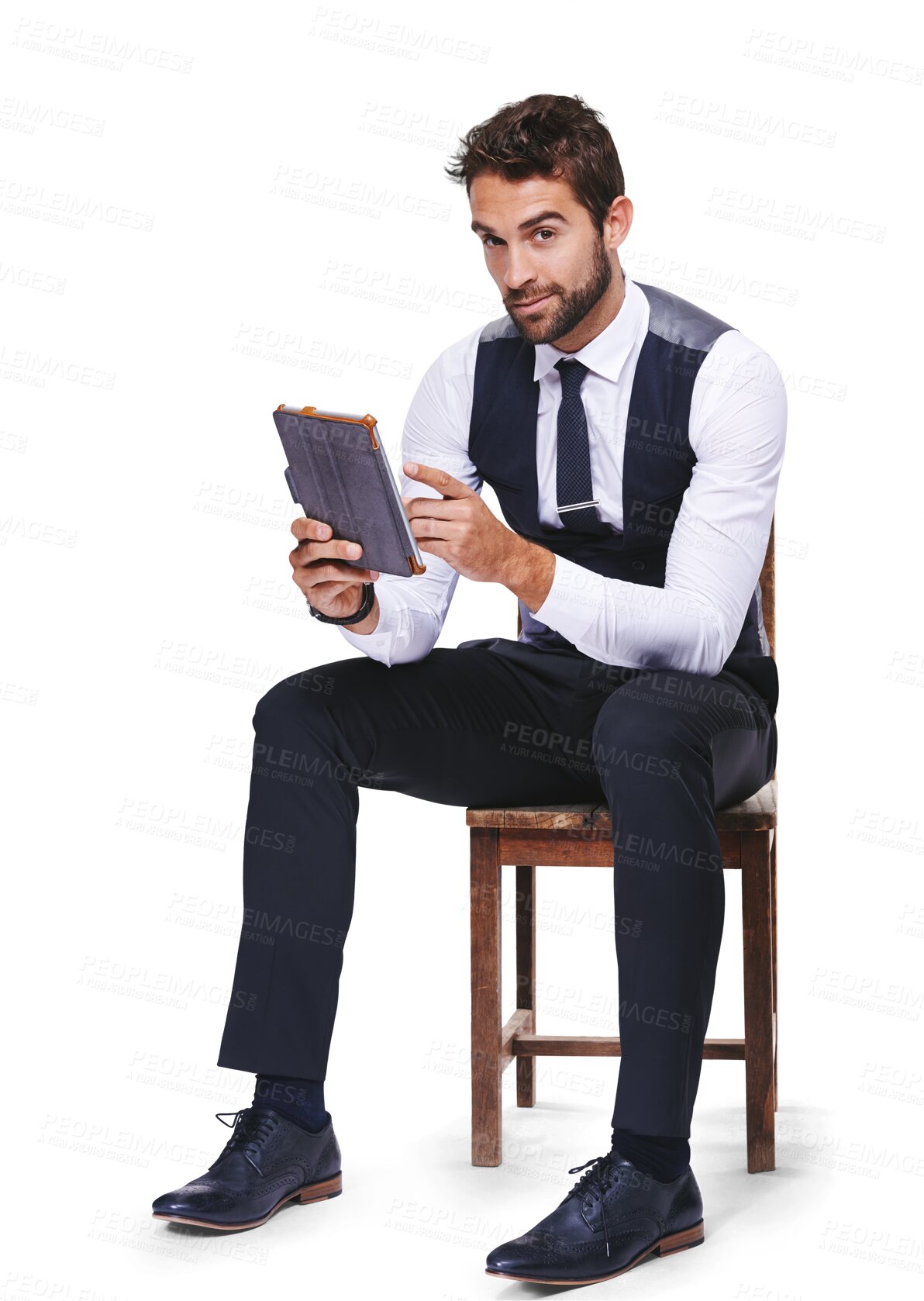 Buy stock photo Portrait, fashion and tablet with a gentleman on a chair in formal clothes isolated on transparent background. Technology, confident and classy with a young male model posing in smart clothing on PNG