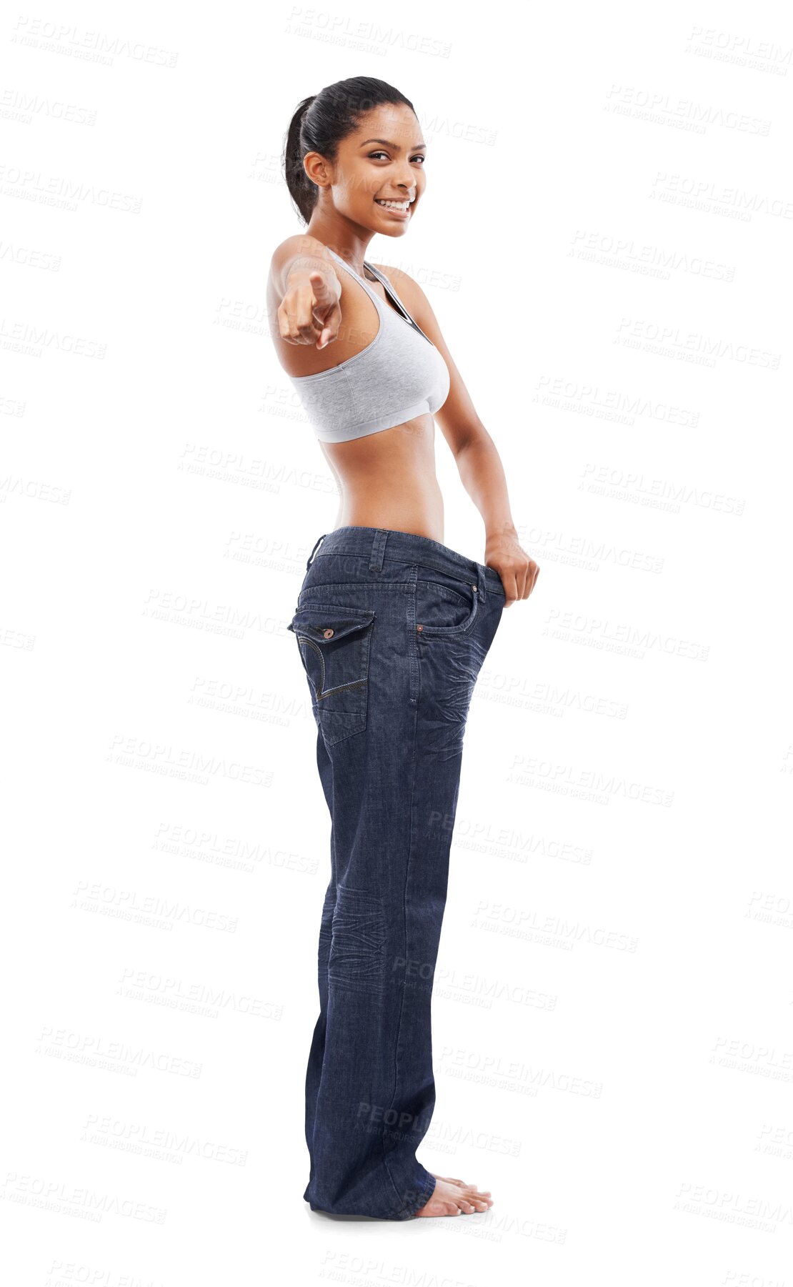 Buy stock photo Portrait, woman and baggy jeans with hand pointing on isolated, transparent and png background. You, finger and female person with lose weight, exercise and healthy lifestyle, diet or motivation