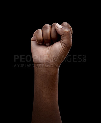 Buy stock photo Human rights, protest and hand in fist for justice or solidarity, equality and support for a community. Fight for change, power. and revolution for freedom or empowerment on black or dark background