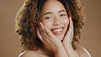 Black woman face, beauty portrait and cosmetic wellness of a model in a studio with happiness. Skin glow, cosmetics and young African person with a smile from skincare in a isolated brown background