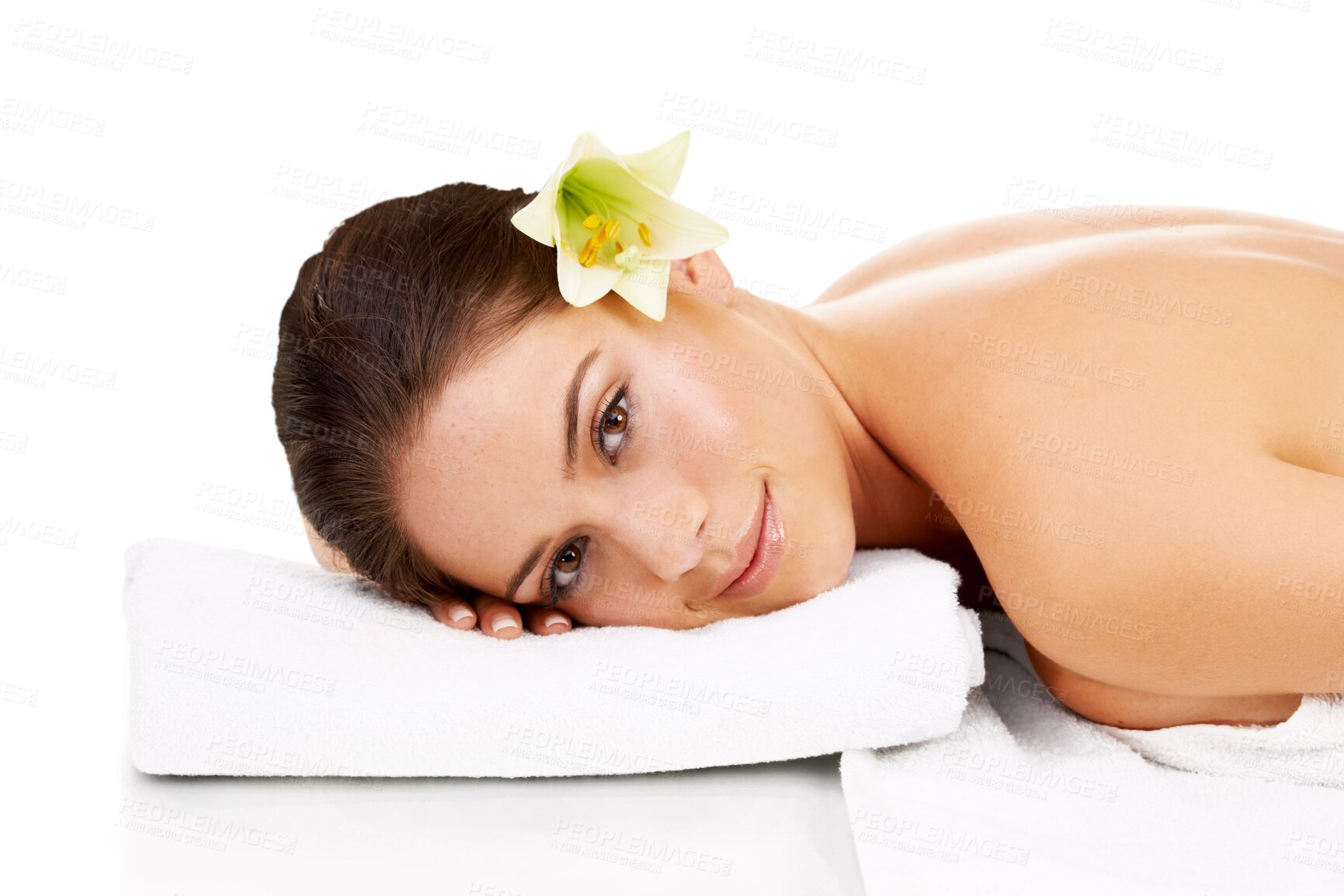 Buy stock photo Woman, face and massage spa treatment with skincare, beauty and dermatology at wellness center. Young female person, flower and massage bed with cosmetics care isolated on transparent, png background