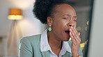 Tired black woman, yawn and night in burnout or overworked on computer at the office. Exhausted African American female employee face yawning from working late at workplace on PC for project deadline