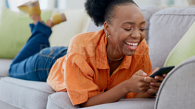 Buy stock photo Relax, funny phone meme or black woman on sofa in communication in house living room. Smile, scroll or happy African lady on couch laughing, texting or reading online gossip on mobile app discussion
