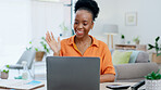 Laptop, wave and black woman on video call in home office, online meeting or webinar. Communication, notebook and happy freelancer or remote worker waving in virtual chat for greeting and discussion.