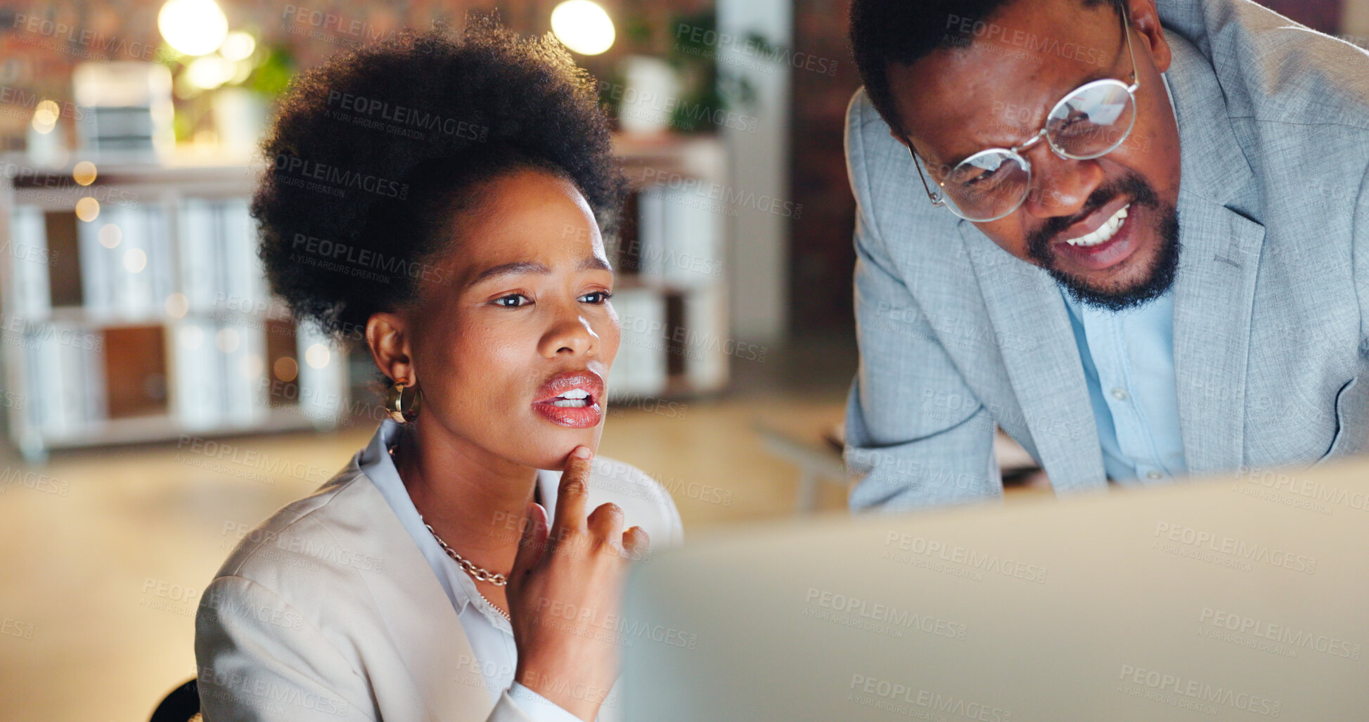 Buy stock photo Collaboration, problem solving and a mentor with an employee in the office at night for project management. Computer, teamwork or planning with a confused business man and woman working together