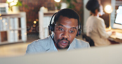 Buy stock photo African man, call center and computer for talk, thinking or night for telemarketing, voip mic or contact us. Consultant, crm and tech support agent for customer service, idea or solution at help desk