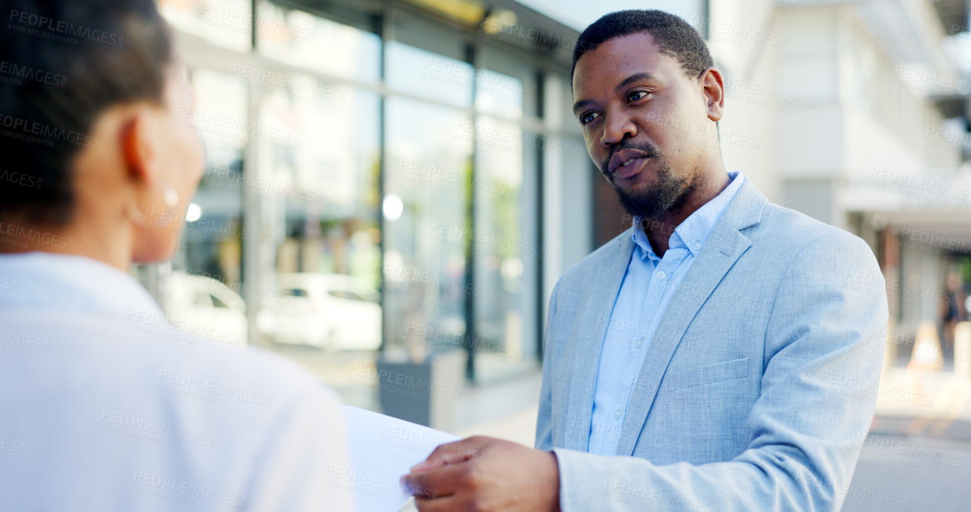 Buy stock photo Consulting, insurance and businessman or salesman talking to a client about a deal in a city. Advice, communication and African agent with a conversation in the street with a customer for retail