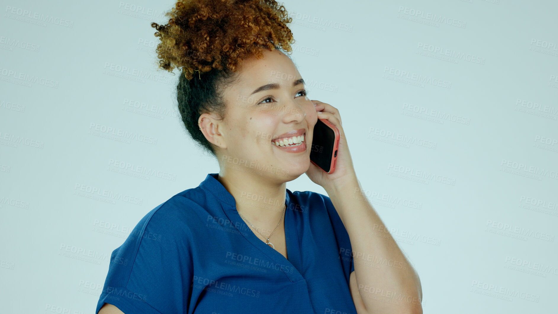 Buy stock photo Woman, laughing or phone call on studio background for joke, communication or funny story on blue mockup space. Happy biracial person, talking or technology for good news, networking and conversation