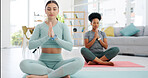 Yoga, women friends and namaste meditation in home living room for mindfulness, peace and wellness. Zen health, pilates and girls meditate with prayer hands, holistic exercise or workout for training