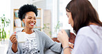 Woman, friends and drinking coffee on sofa laughing for funny chat, socializing or bonding together at home. Women relaxing on living room couch with laugh for fun joke, meme or communication indoors