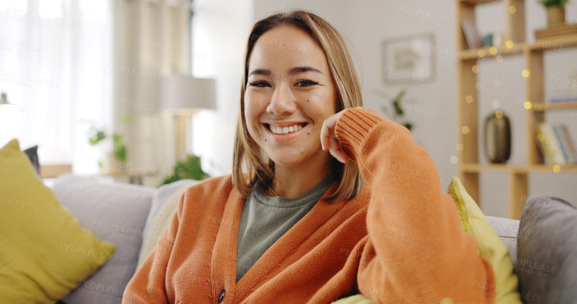 Buy stock photo Happy asian woman, portrait and relax on sofa for holiday, weekend or break in living room at home. Face of female person smile in happiness on lounge couch for rest, wellness or comfort in house