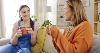 Buy stock photo Friends, conversation or women on couch with coffee, bonding and talking in living room to relax. Support, tea drink or happy people on sofa listening or speaking of gossip in discussion in home 