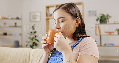 Buy stock photo Relax, coffee and and woman on a sofa calm, chilling and enjoying me time, cozy and comfortable in her home. Peaceful, resting and female person drinking tea in a living room with weekend freedom 