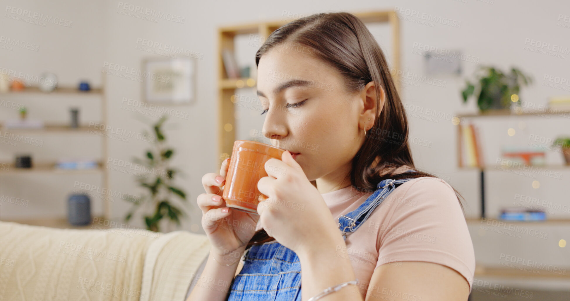 Buy stock photo Relax, coffee and and woman on a sofa calm, chilling and enjoying me time, cozy and comfortable in her home. Peaceful, resting and female person drinking tea in a living room with weekend freedom 