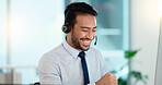 Call center agent consulting a buyer via video call in an office. A young friendly sales man talking to a client in a virtual meeting. A male customer service employee advising a consumer