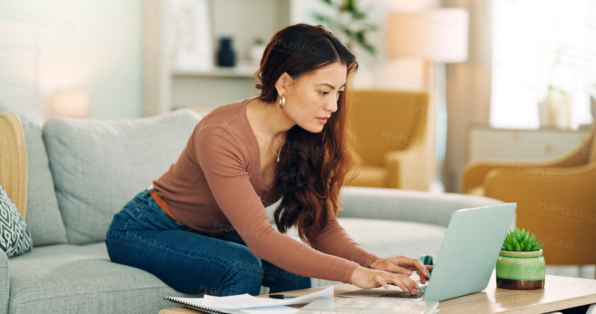 Buy stock photo Entrepreneur, professional and startup worker on her laptop inside home office. Woman thinking, idea and planning digital marketing employee online. Remote, communication and email in house lounge.