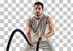 PNG studio shot of a muscular young man exercising with battle ropes against a white backgroundisolated on a transparent PNG background