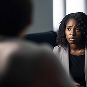 Black woman, sad and thinking in psychologist clinic for mental health ...