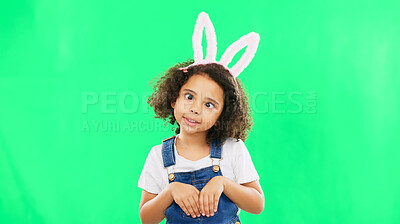 Buy stock photo Kids, easter and playful with a girl on a green screen background in studio feeling silly while having fun. Children, bunny and holiday with a cute little female child playing on chromakey mockup