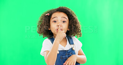 Face, green screen and child with finger on lips for quiet, silence or shush gesture on studio background. Noise, whisper and girl portrait with secret, emoji and hand symbol while posing isolated