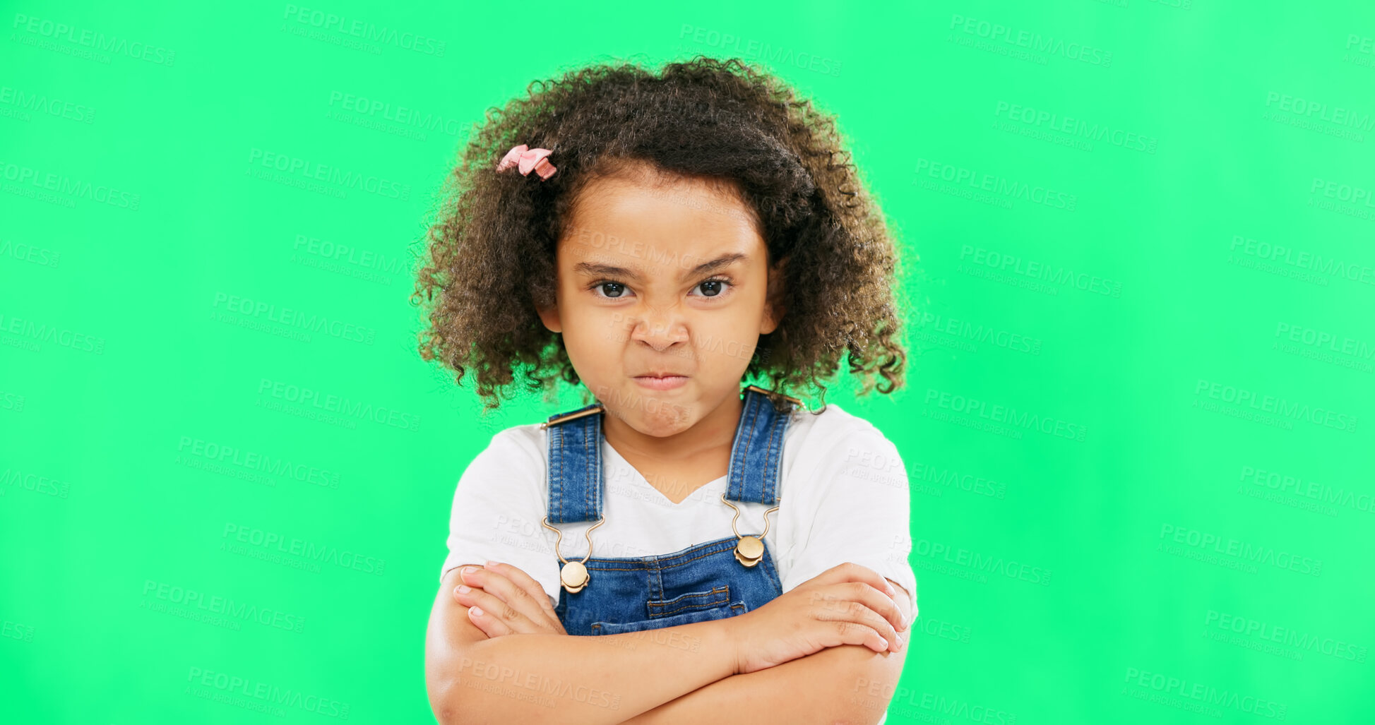 Buy stock photo Girl, angry and portrait with arms crossed on green screen with attitude, moody or frustrated in studio. Mexican child, face and grumpy emoji with mockup in body language, adhd or autism in closeup