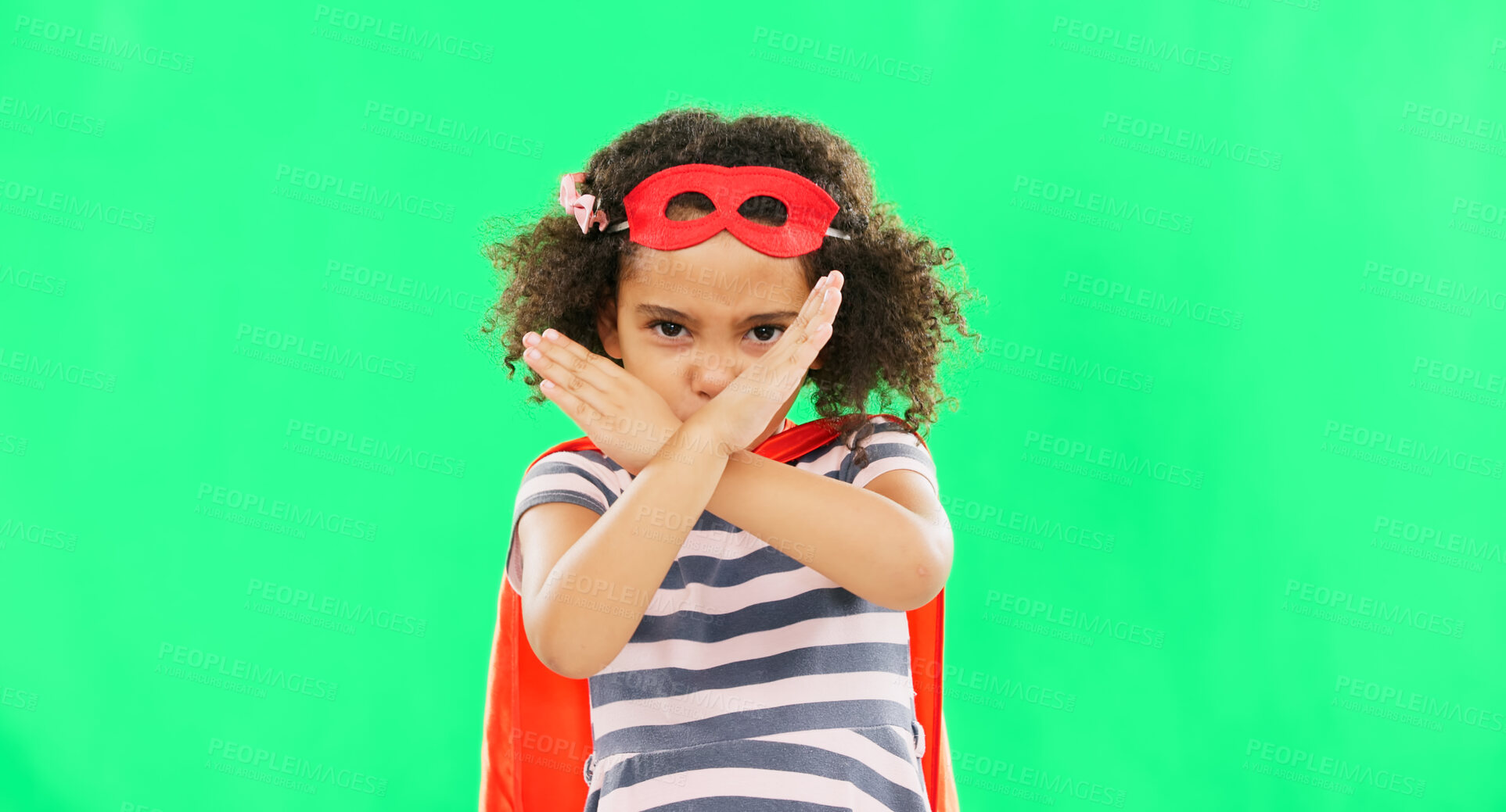 Buy stock photo Superhero, child and stop sign on green screen with hands to fight crime with fantasy or cosplay costume. Girl power, hero and pretend game with strong kid and portrait to protect freedom and justice