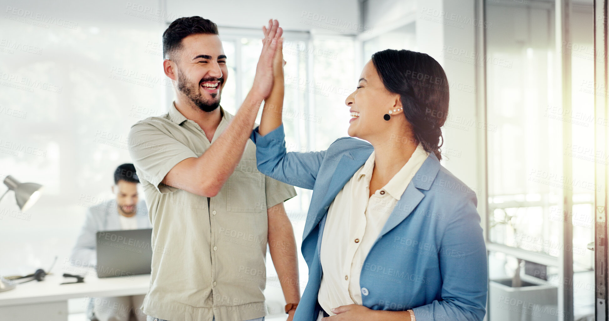 Buy stock photo Success, high five and teamwork of funny business people in celebration in creative startup office. Excited, hands together and workers laughing for goal achievement, target and support for deal win