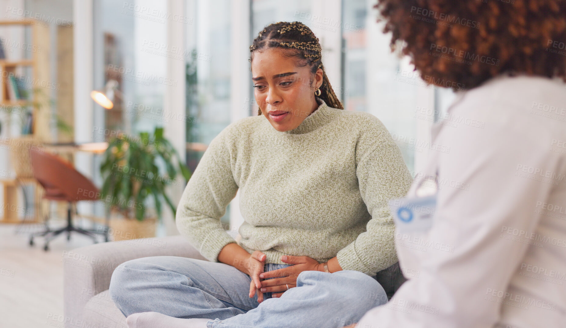Buy stock photo Mental health, consulting and woman crying with doctor on sofa with conversation, help and support. Advice, psychology and therapist with patient on couch for depression counseling, care and therapy.