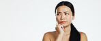 Skincare, thinking and Asian woman in a studio with a beauty, self care and natural routine. Question, doubtful and portrait of a female model with dermatology facial treatment by white background.