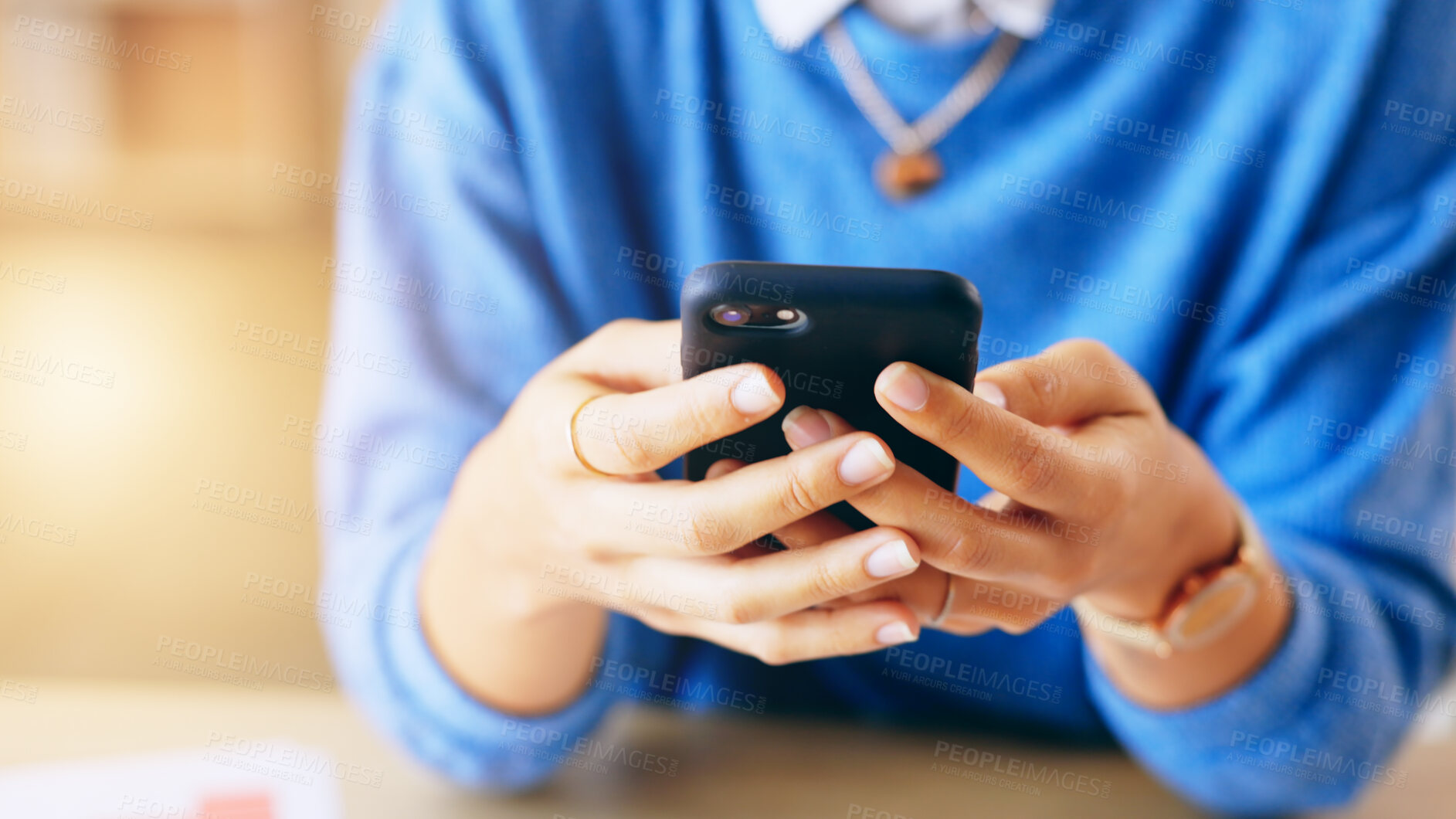 Buy stock photo Phone, woman and hands with social media, text and networking at table. Internet, app search and cellphone typing with female person on a mobile website of a freelancer with work from home message