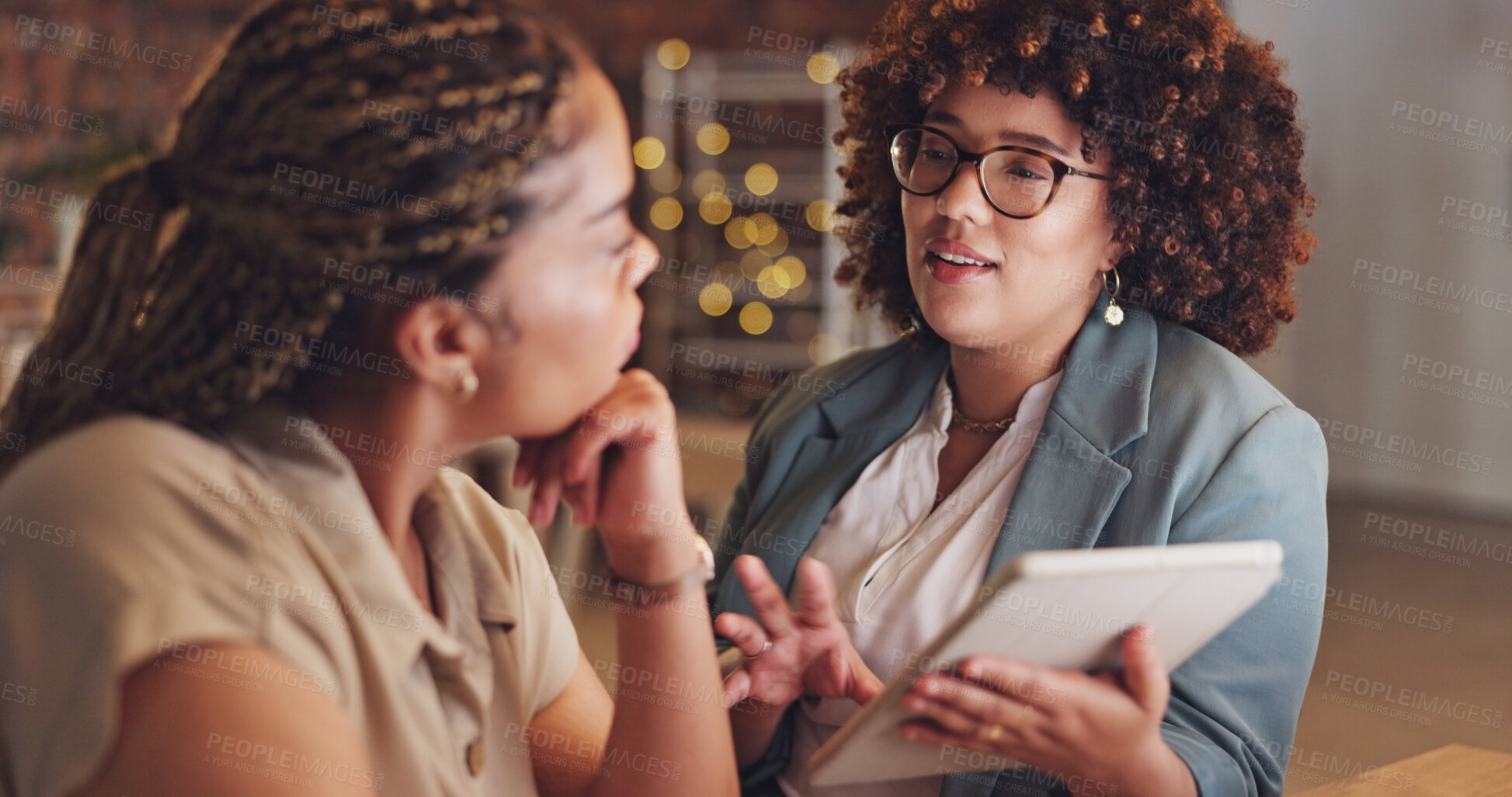 Buy stock photo Tablet, collaboration and business women in discussion for teamwork on startup project and research on internet. Office, night and professional employee team working on strategy or talking in company