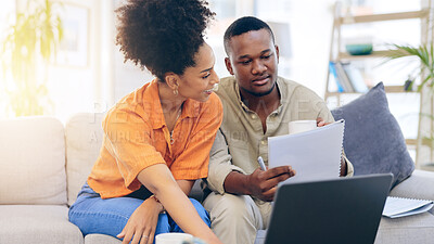 Buy stock photo Black couple, laptop and documents for budget of finance, mortgage or expenses on living room sofa at home. Happy, tax and savings data on computer with paperwork for payment or bills on couch