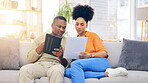 Black couple,tablet, documents and financial crisis on living room sofa discussing mortgage payment or loan at home. Frustrated African man and woman with paperwork in debt, finance issue or money problems