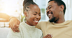 Relax, happy and love with black couple on sofa for conversation, bonding and support. Affectionate, communication and hug with man and woman in living room at home for laugh, free time and weekend