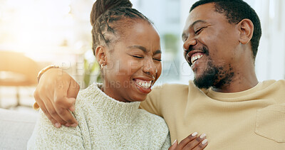 Buy stock photo Laugh, relax or happy black couple hug on home living room sofa together with love, support or trust. Wellness, comedy joke or silly man with a funny African woman with bond, joy or smile in marriage