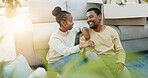 Black couple relax on floor, moving in and conversation while taking break, new home owner and communication. Happy people in living room, relationship with resting and talking in house with planning