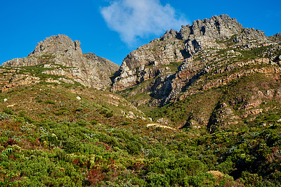 Buy stock photo Landscape view of Table Mountain, Cape Town in Western Cape, South Africa. Beautiful scenery of a popular tourist attraction during the day against a cloudy blue sky. Natural landmark for hiking