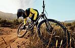 Cycling, mountain bike and man fixing chain for bicycle maintenance, repair and problem solving broken bike gear. Countryside fitness, nature exercise and training athlete travel in Las Vegas desert
