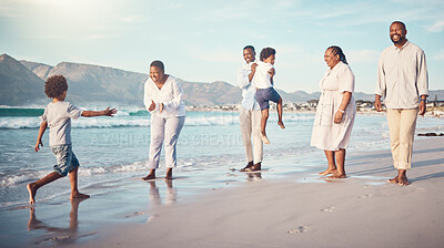 Buy stock photo Beach, african kids and grandparents with parents, love and running together for bonding, play and game. Happy black family, ocean holiday and summer with smile, comic laugh and applause by sea waves