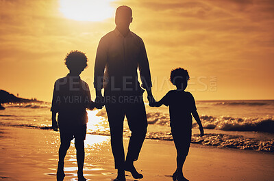 Buy stock photo Silhouette, sunset and father holding hands with children at the beach for walking, bonding and vacation. Dark, care and dad with kids at the ocean for a walk, travel and quality time together