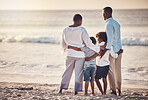 Black family, hug at beach travel and together watching the ocean waves view, freedom with parents and kids outdoor. Man, woman and children, vacation in Bali with nature and content, peace and back