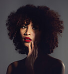 Shadow, red lipstick and makeup on woman with beauty or natural hair in studio. Face of aesthetic female model with a skin glow, shine and color on lips for art, power and facial skincare