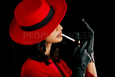 Buy stock photo Vintage, style and a woman smoking a cigarette with retro fashion, style and aesthetic. 90s, mystery and a model or mafia girl with a smoke and fashionable isolated on a black background in a studio