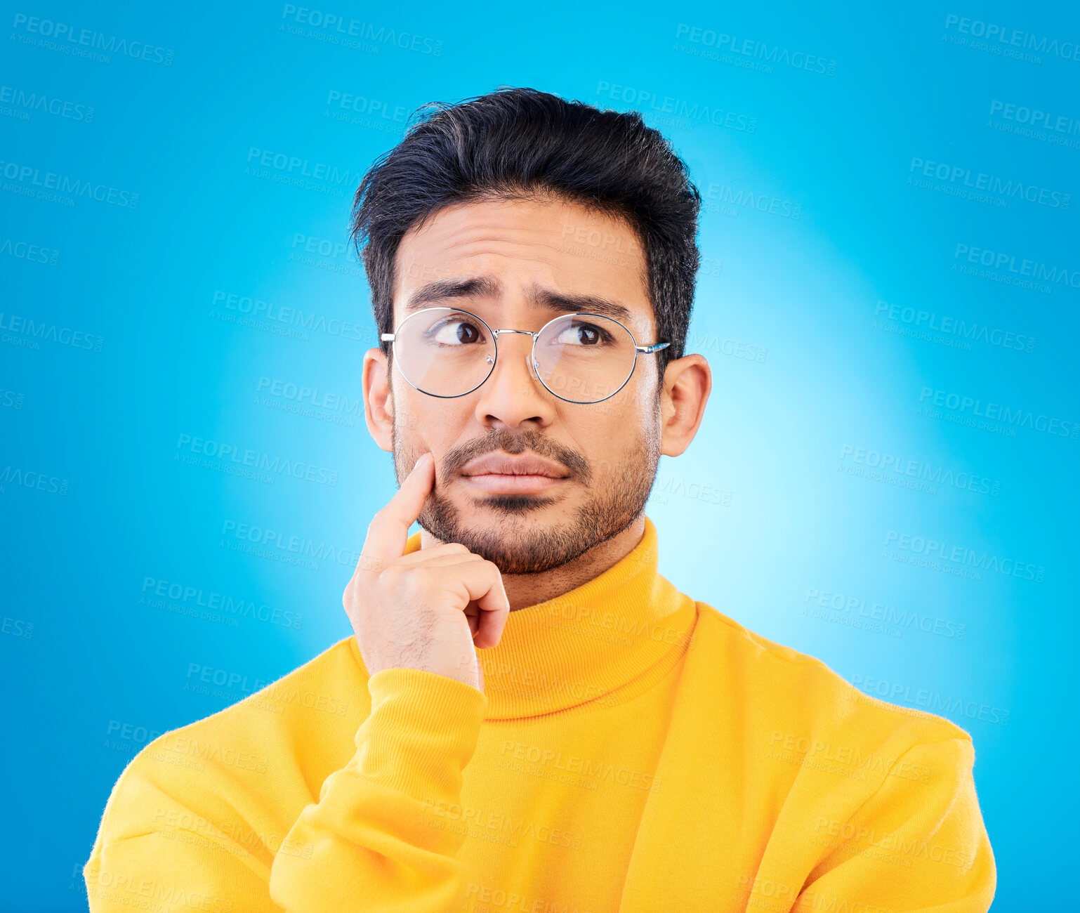 Buy stock photo Thinking, face or studio man planning solution, problem solving inspiration or doubt idea, question or confused. Mindset, wonder or person brainstorming options, decision or choice on blue background