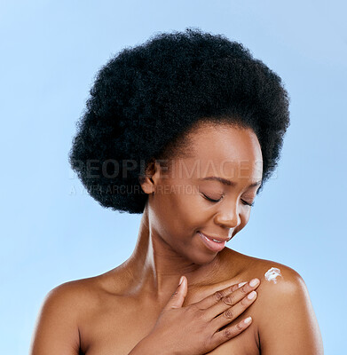 Buy stock photo Black woman, cream and beauty, body care and cosmetics with moisturizer isolated on blue background. Dermatology, African model and sunscreen with skincare, afro hair and wellness with grooming