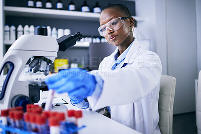 Buy stock photo Blood test, microscope and science woman in laboratory for cancer research, medical analysis and dna test. Biotechnology, red liquid and scientist, doctor or african person, check tube in healthcare